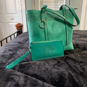 Green tote with punch detail and matching wallet